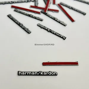 Эмблема Harman Kardon для динамиков BMW, размер 44×5 мм. Крепление на скотч. Шильдик, эмблема на динамики